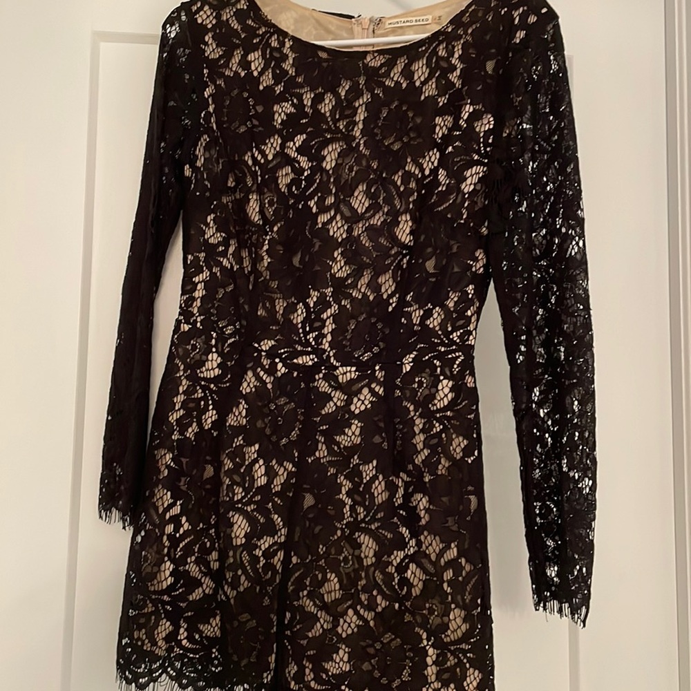 Romper with black lace and nude underlay size Medium with lace edges